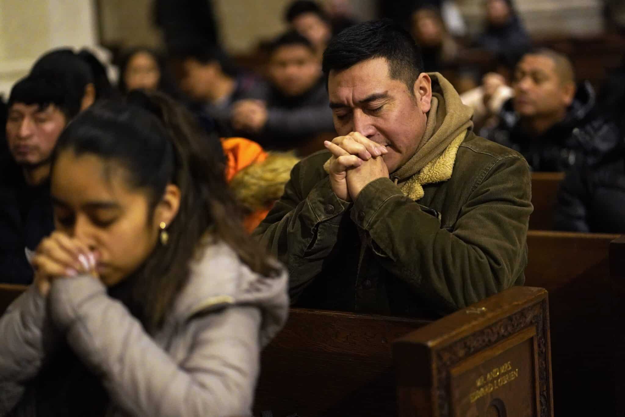 People pray during a special Mass celebrated in honor of the Black Christ of Esquipulas, Guatemala, Jan. 7, 2024, at St. Patrick's Cathedral in New York City. Results of a Gallup poll released March 25 showed that regular church attendance in the U.S. continues to decline across the board, particularly among Catholics. (OSV News photo/Gregory A. Shemitz)