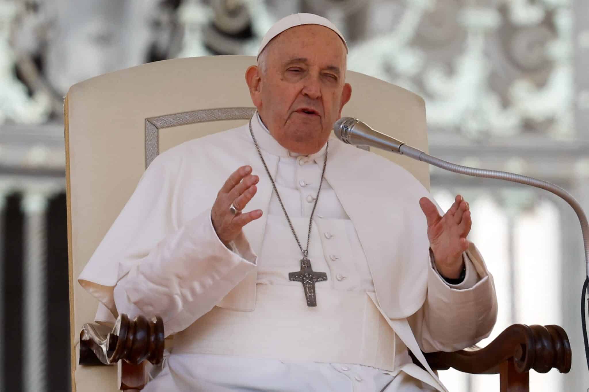 Pope Francis tells visitors in St. Peter's Square that an aide will read the catechesis he prepared for his general audience at the Vatican March 20, 2024. (CNS photo/Lola Gomez)