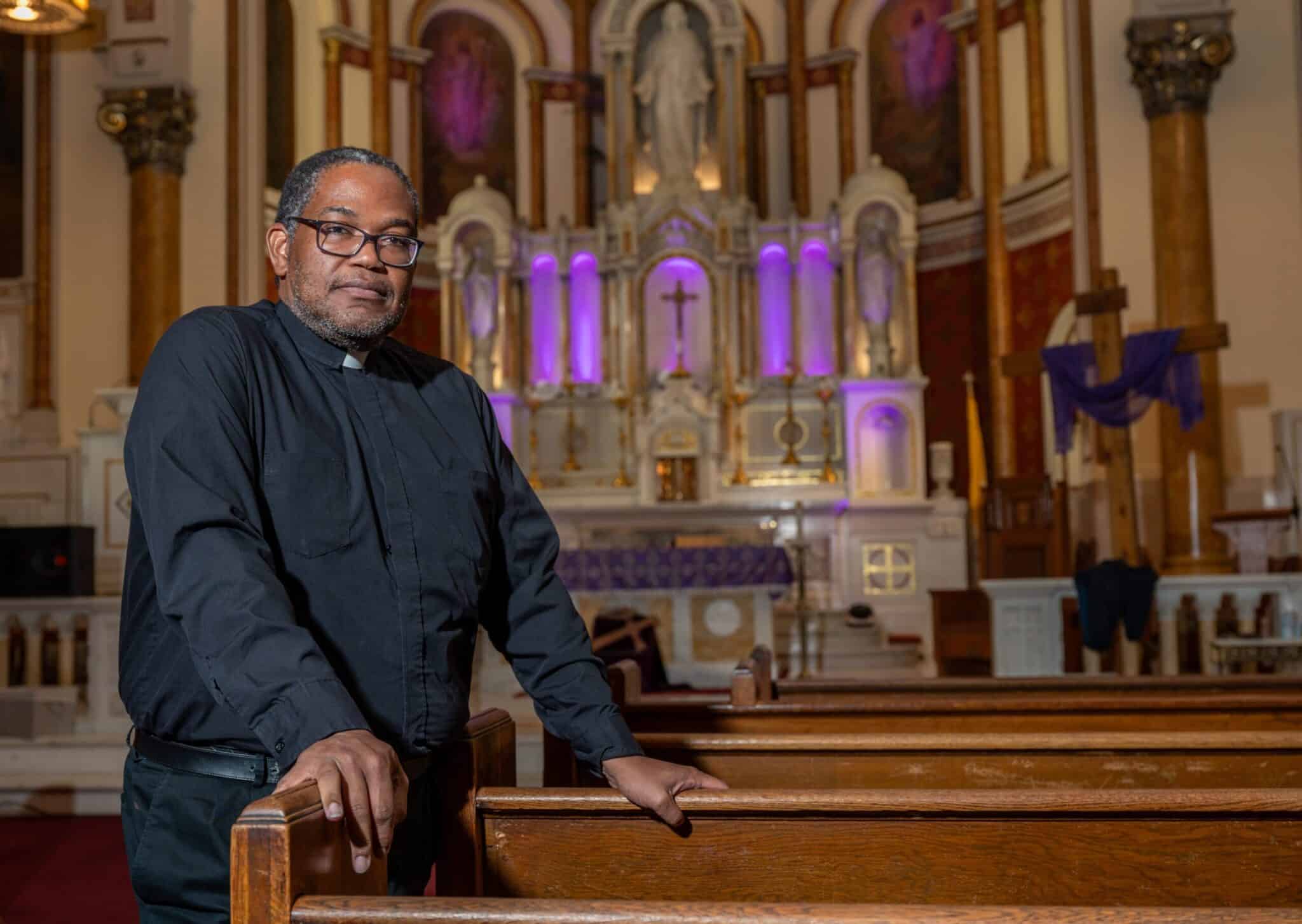 Redemptorist Father Ako Trevor Walker, pastor of Sacred Heart of Jesus/Sagrado Corazón de Jesús Parish in Baltimore, is pictured March 27, 2024. Father Walker is providing a spiritual presence to families of construction workers lost in the Francis Scott Key Bridge collapse in the early hours of March 26. Sacred Heart is a largely Spanish-speaking parish, and the priest is active in supporting new immigrants in the Baltimore area. (OSV News photo/Kevin J. Parks, Catholic Review)