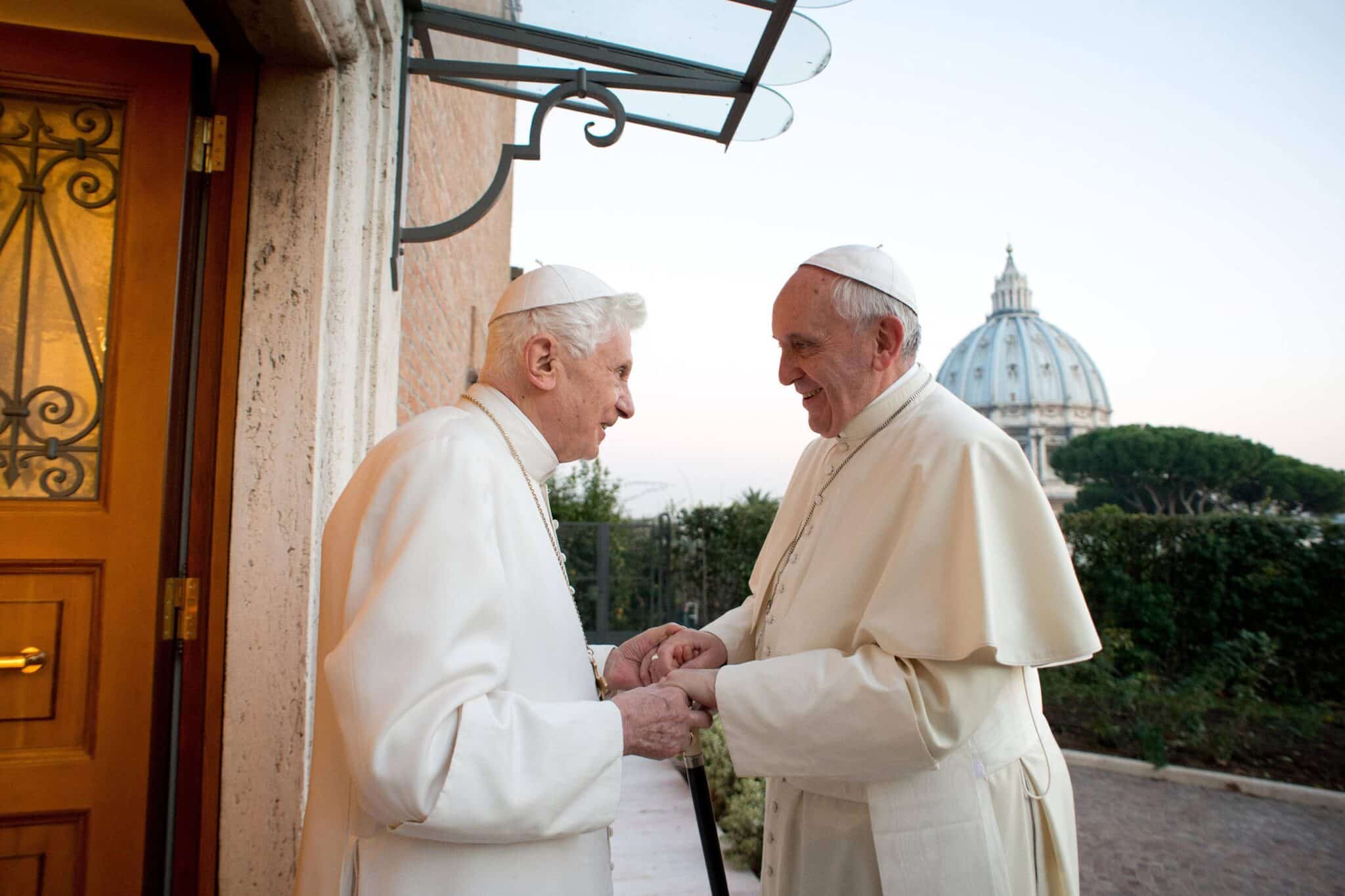 Pope Francis greets retired Pope Benedict XVI at the retired pontiff's Vatican residence Dec. 23, 2013. (CNS photo/Vatican Media)