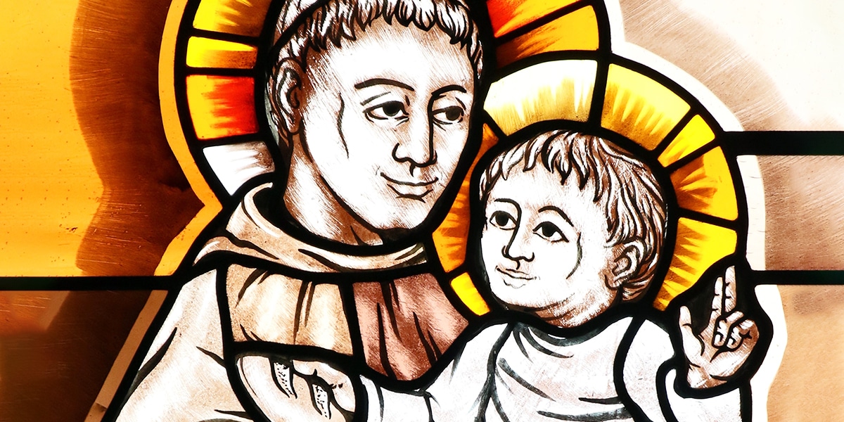 Saint Anthony holds the child jesus