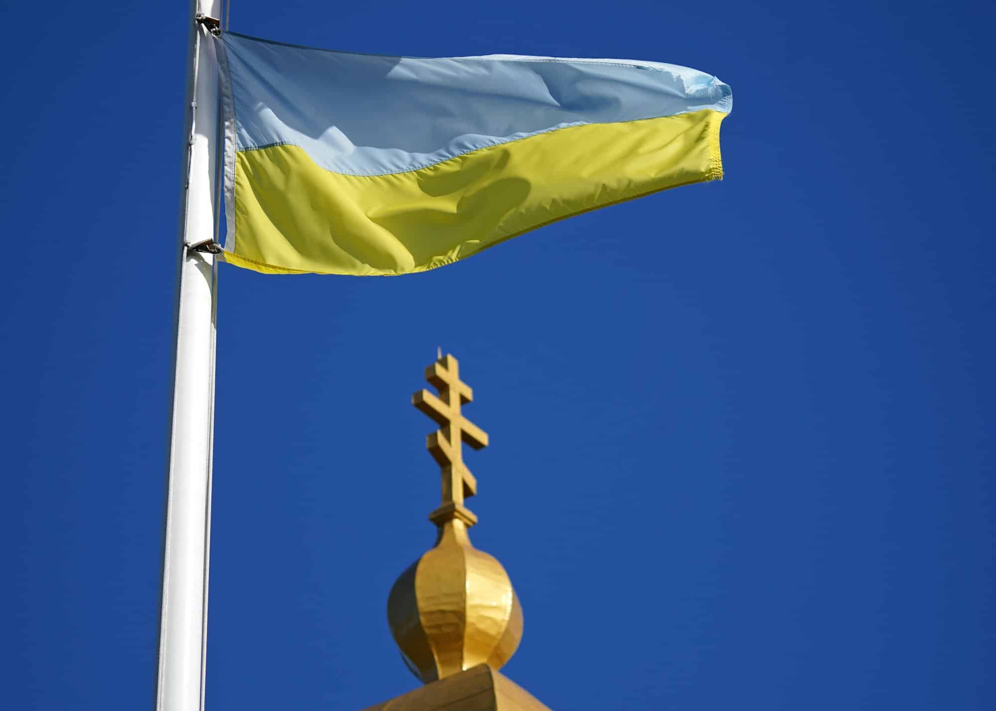 The flag of Ukraine is seen outside St. John the Baptist Ukrainian Catholic Church in Riverhead, N.Y., in 2021. (CNS photo/Gregory A. Shemitz)