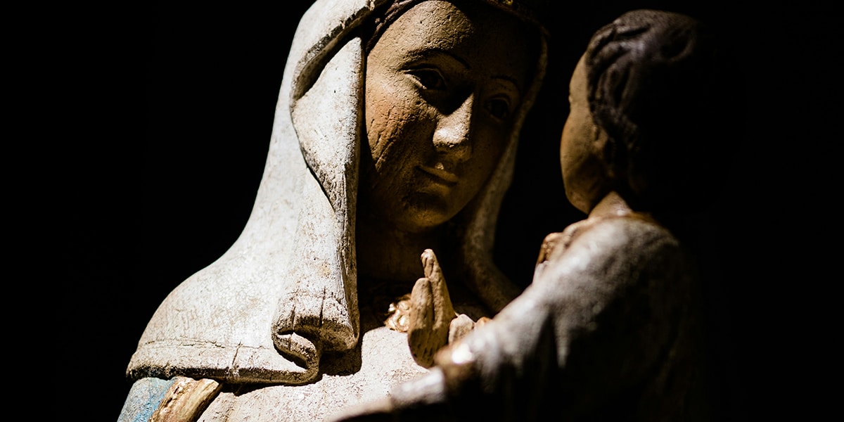 wooden figurines of Mary and Jesus