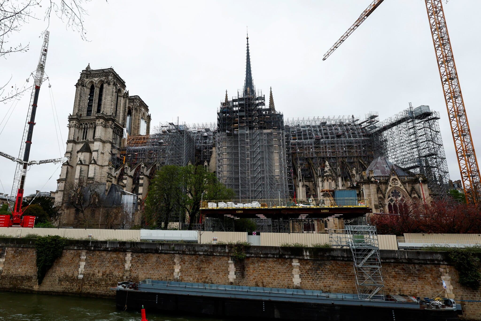 A general view shows the Notre Dame Cathedral in Paris March 30, 2024, with a new spire topped by the rooster and the cross, as restoration works continued following a devastating fire in 2019. (OSV News photo/Gonzalo Fuentes, Reuters)