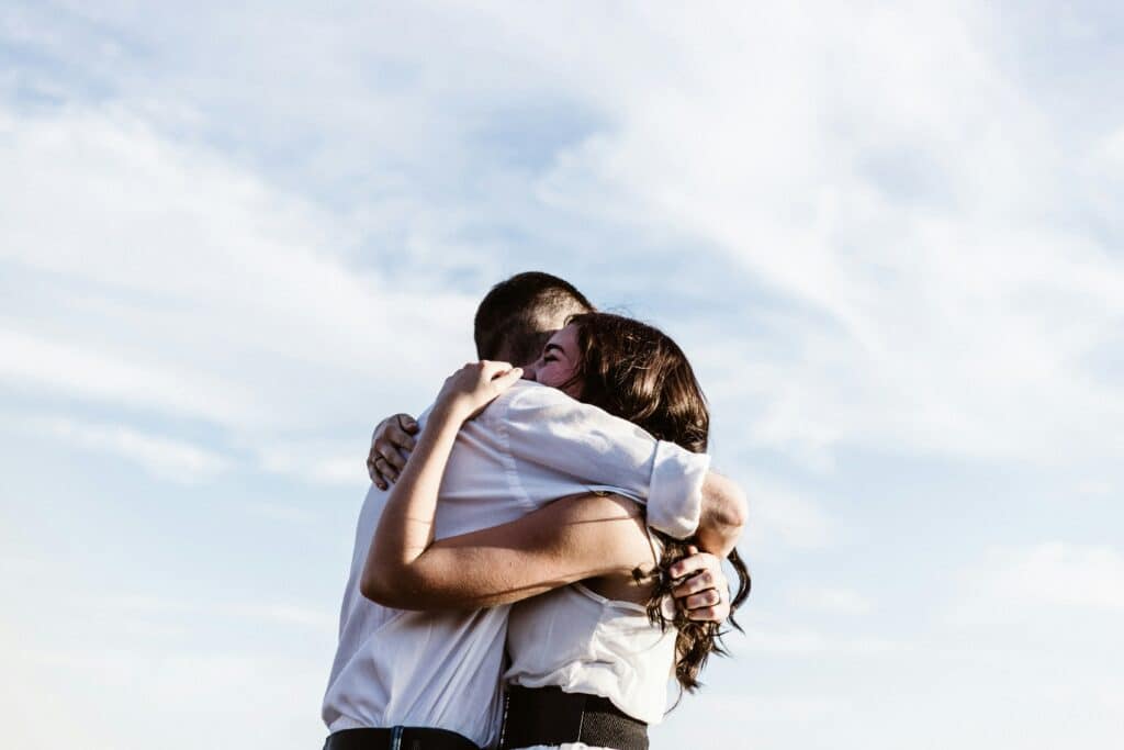 Two people hugging, not othering | Photo by Priscilla Du Preez 🇨🇦 on Unsplash

