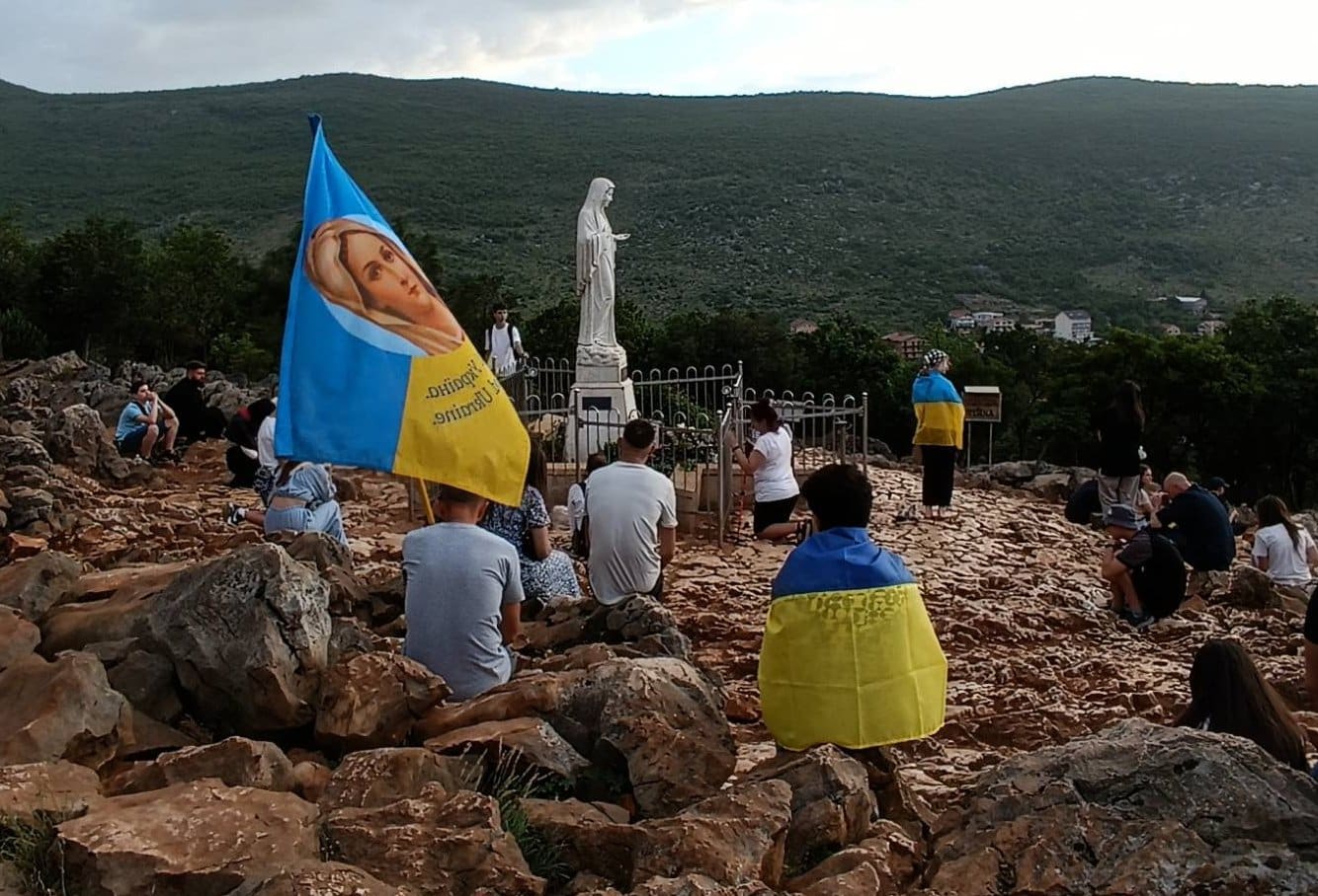 Ukrainian youth pray on Apparition Hill (Mount Podbrdo) in Medjugorje, Bosnia and Herzegovina during a May 19-27, 2024 pilgrimage for peace as Russia escalates attacks on their nation amid a war now in its 11th year. (OSV News/Sister Lucia Murashko/Oksana Dmyterko)