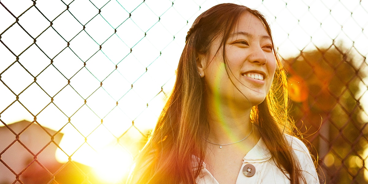 young woman with a infectious joyful smile