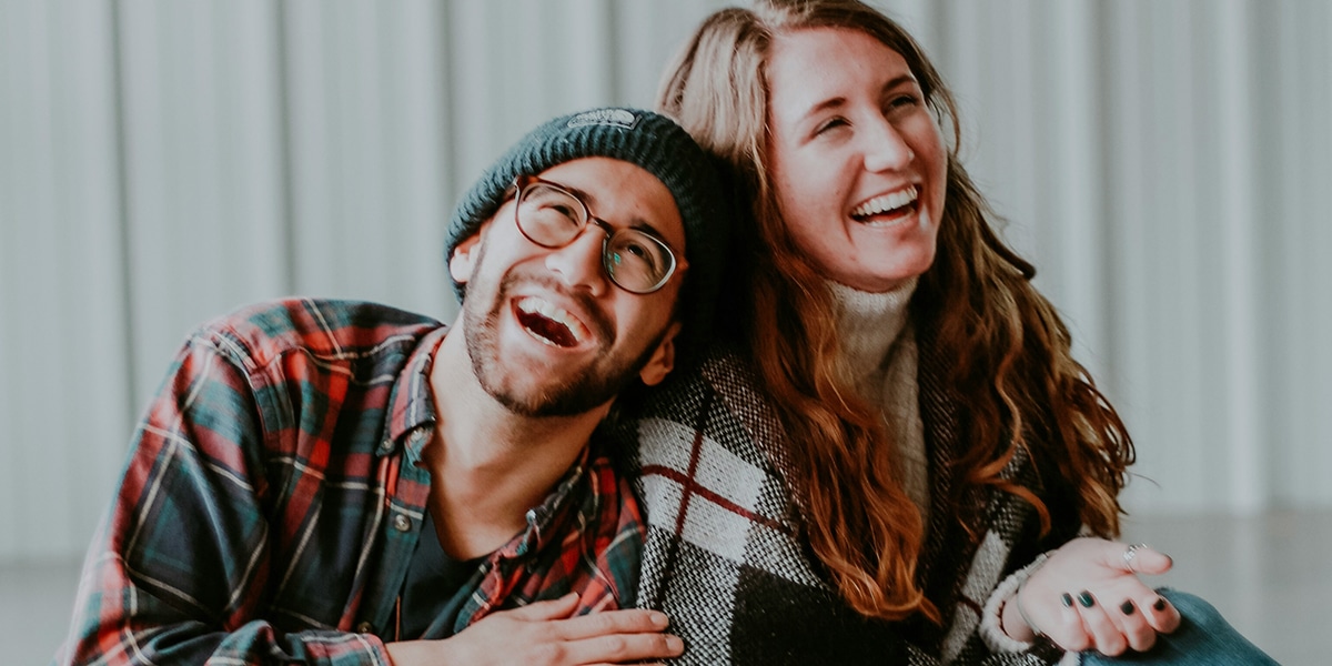 Couple laughing, joyfully