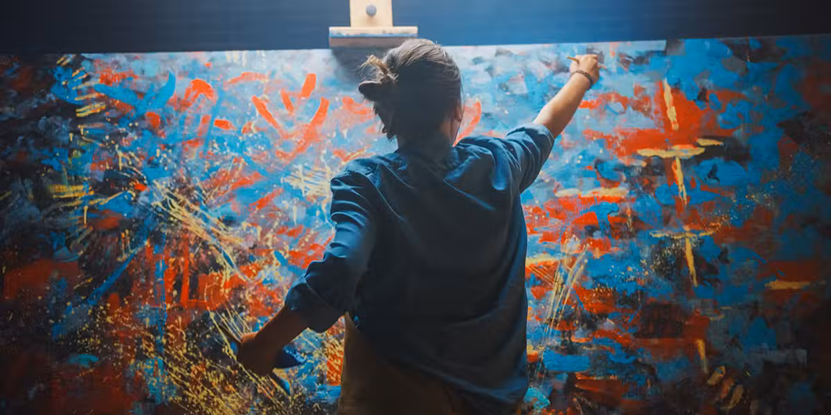 Artist female painting a canvas