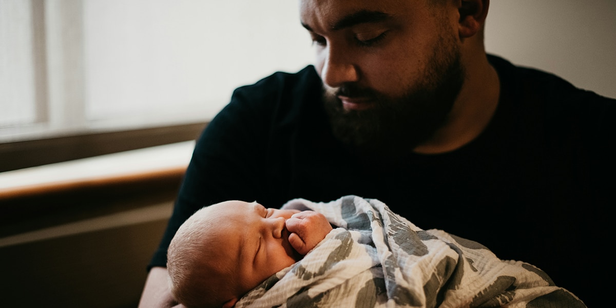 Father holding baby