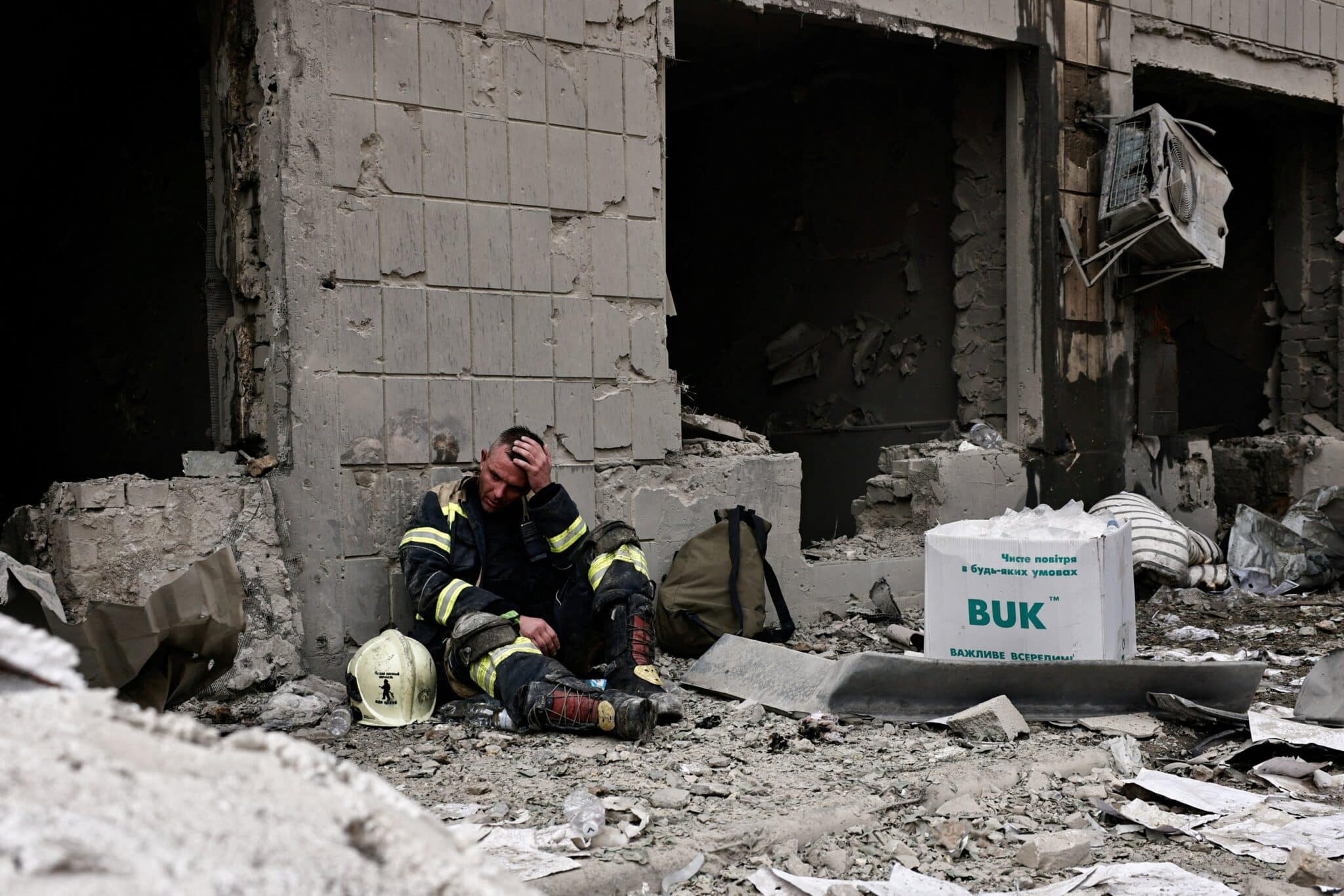 A rescuer reacts at Okhmatdyt Children's Hospital in Kyiv, Ukraine's capital, July 8, 2024, after it was severely damaged during Russian missile strikes amid Russia's war on Ukraine. At least 31 were killed and over 135 injured as Russian bombers pummeled Kyiv and numerous other cities throughout the nation that day with more than 40 missiles and guided aerial bombs, with one striking the large children's hospital, where emergency crews searched the rubble for victims.
