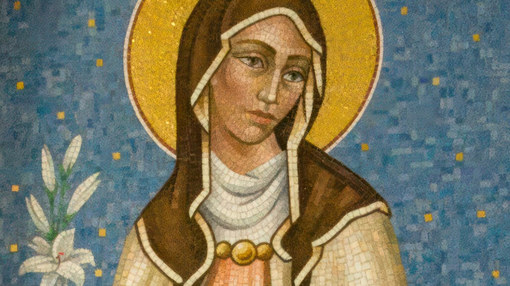 a tile mosaic art piece depicting St. Clare