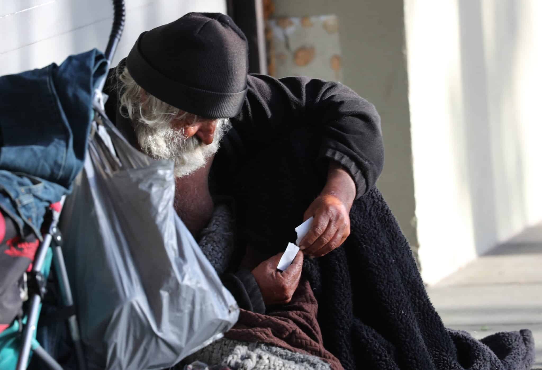 A homeless man sits with his belongings along a street in San Francisco May 19, 2024. On Dec. 27, the U.S. Department of Housing and Urban Development released its 2024 Annual Homelessness Assessment Report, which found homelessness in the U.S. has surged 18% to a new record in 2024.