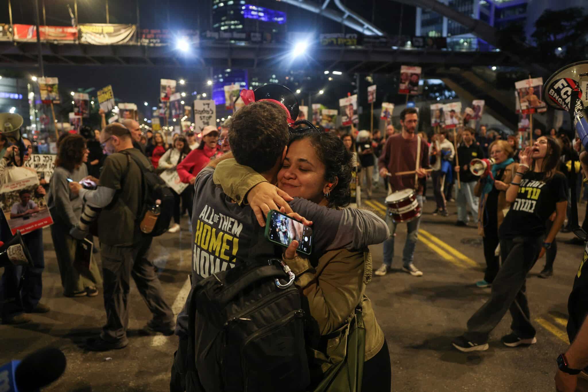 Supporters of Israeli hostages, who were kidnapped during the deadly Oct. 7 2023, attack by Hamas, react to a Gaza ceasefire deal as they attend a protest in Tel Aviv, Israel, Jan. 15, 2025