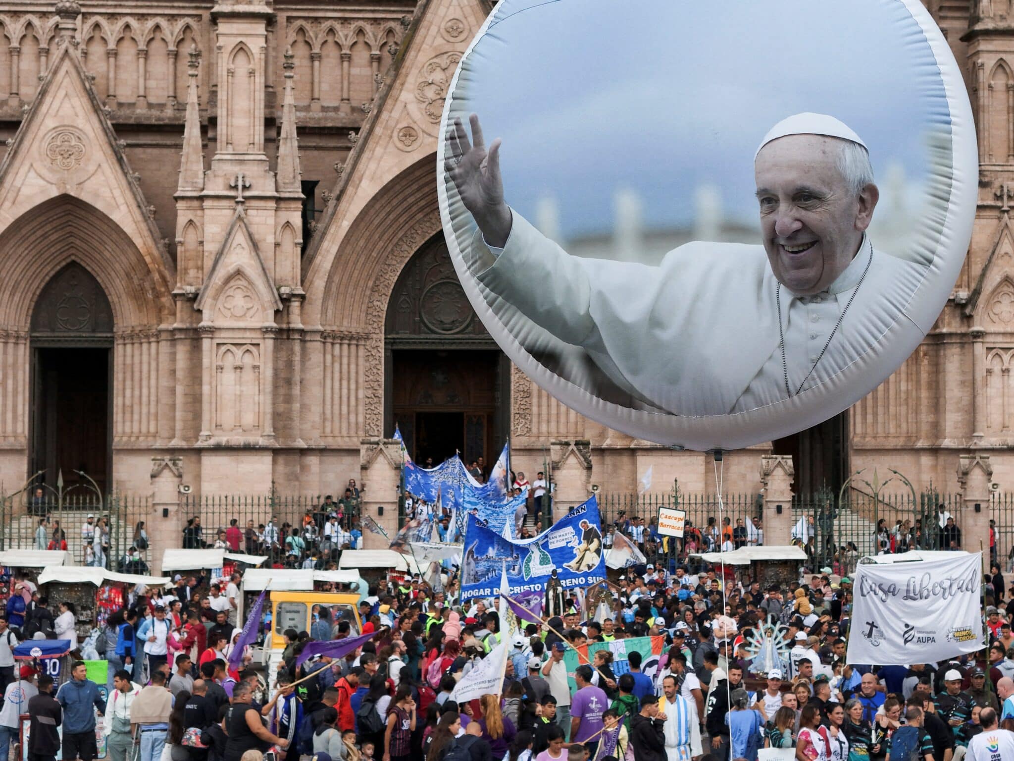 A balloon with an image of Pope Francis is seen as thousands of worshippers gather to attend a Mass at the Basilica of Lujan in the province of Buenos Aires, Argentina, March 16, 2025, to pray for the pope amid his ongoing treatment for double pneumonia at Rome's Gemelli Hospital, where he was admitted Feb. 14. The Vatican confirmed that the 88-year-old pontiff concelebrated Mass at the hospital chapel March 16. (OSV News photo/Martin Cossarini, Reuters)
