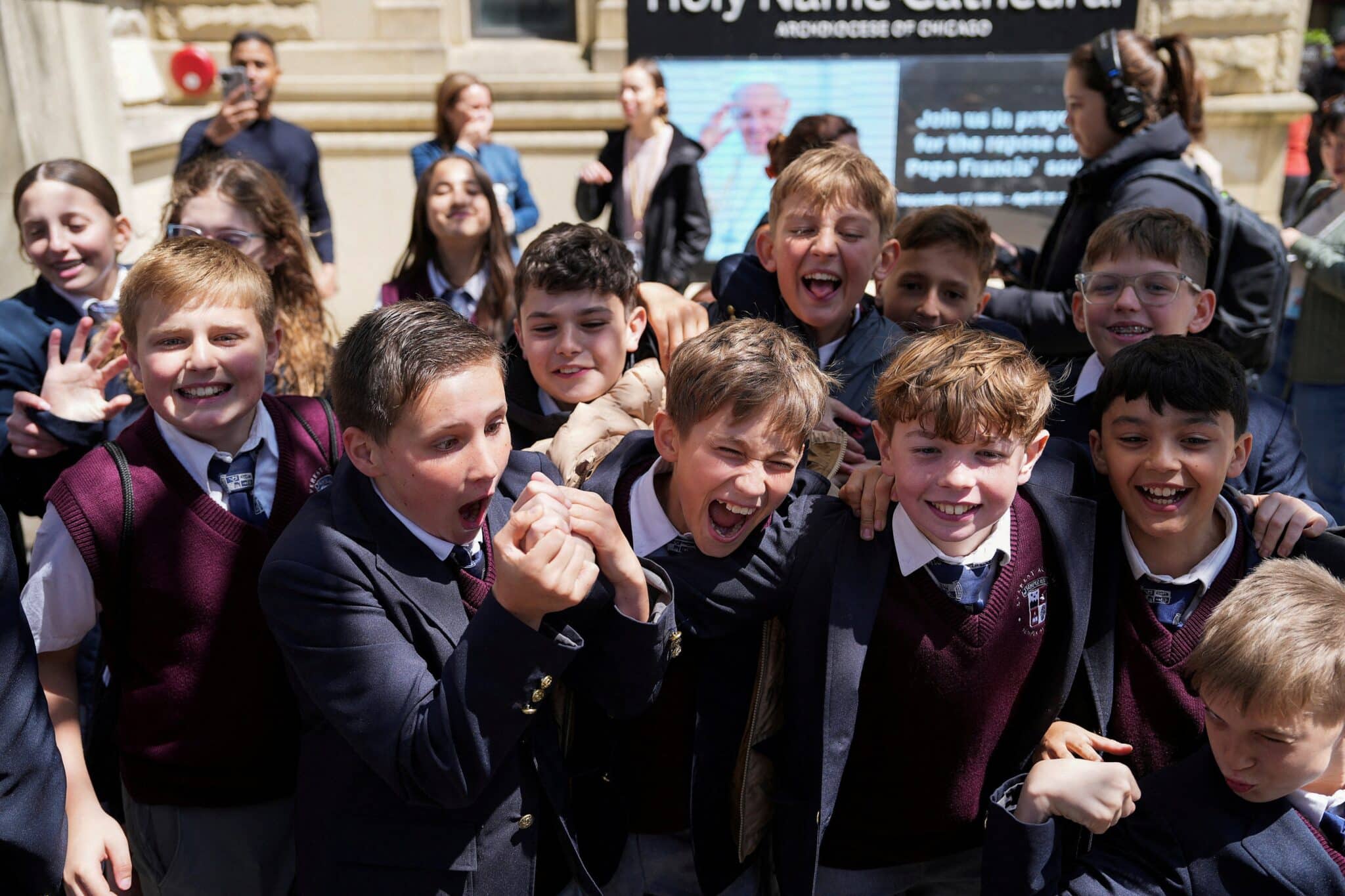 Students from Everest Academy in Lemont, Ill., cheer May 8, 2025, after it was announced that Chicago-born Cardinal Robert Francis Prevost was elected as the next pope. He chose the papal name Leo XIV. (OSV News photo/Vincent Alban, Reuters)
