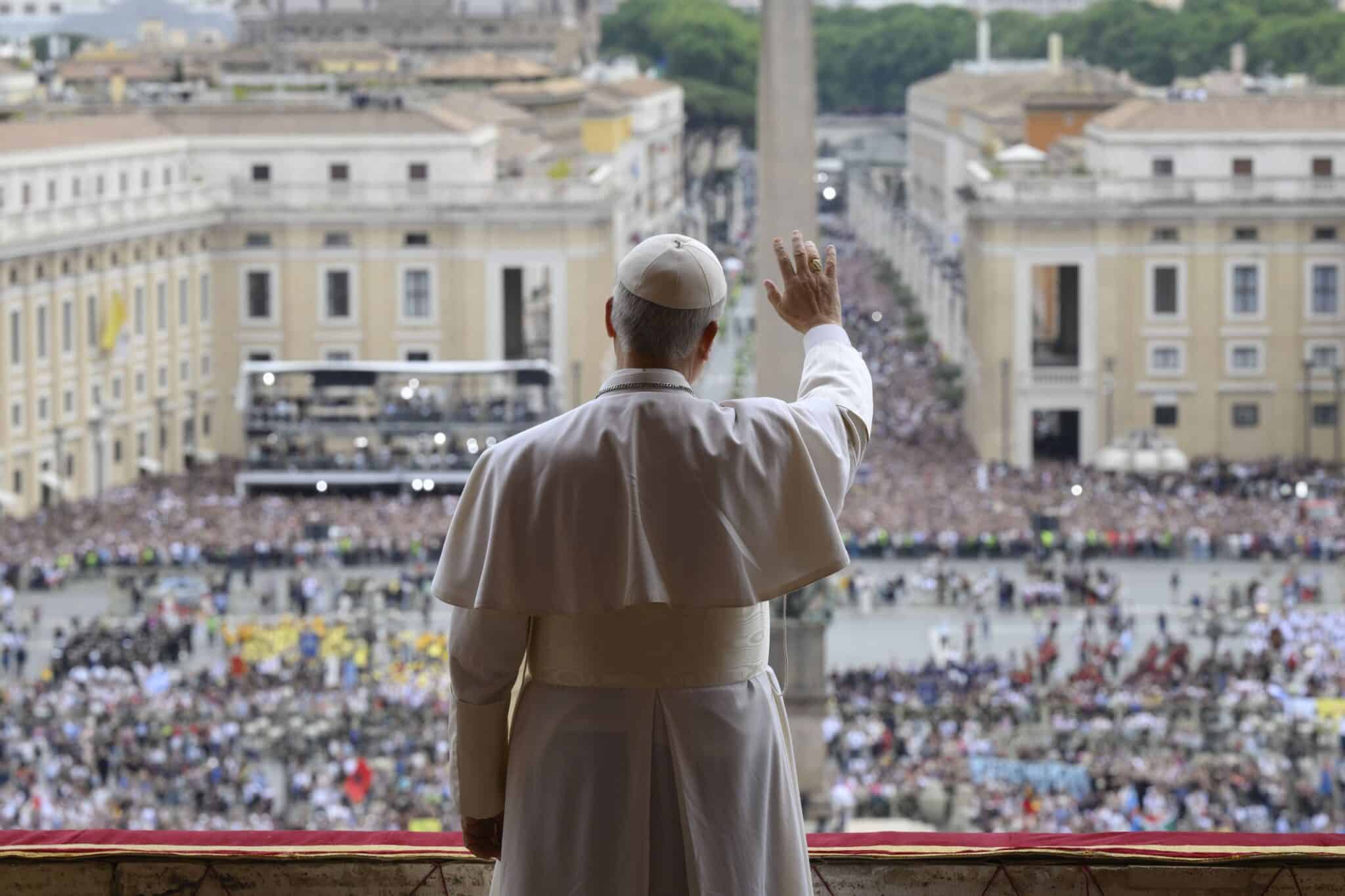 Pope Leo XIV waves to the crowd from the central balcony of St. Peter's Basilica at the Vatican as he leads, for the first time, the midday recitation of the "Regina Coeli" prayer May 11, 2025. (CNS photo/Vatican Media)