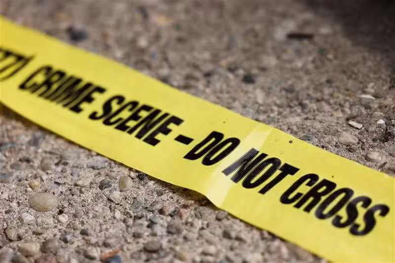 Crime scene tape is seen in this illustration photo.