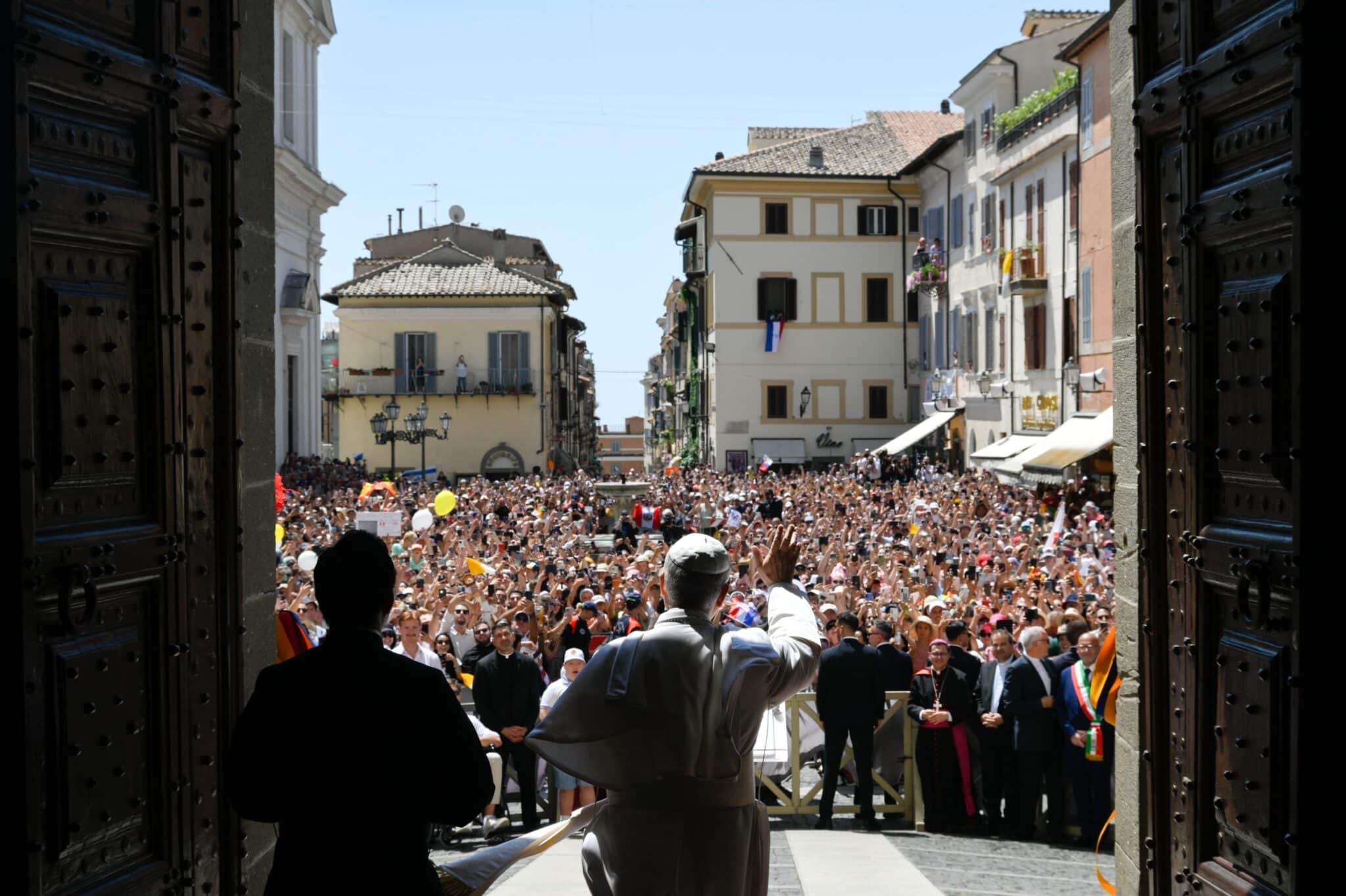 Pope Leo XIV greets visitors ahead of the Angelus prayer in Castel Gandolfo, Italy, July 20, 2025. (CNS photo/Vatican Media)