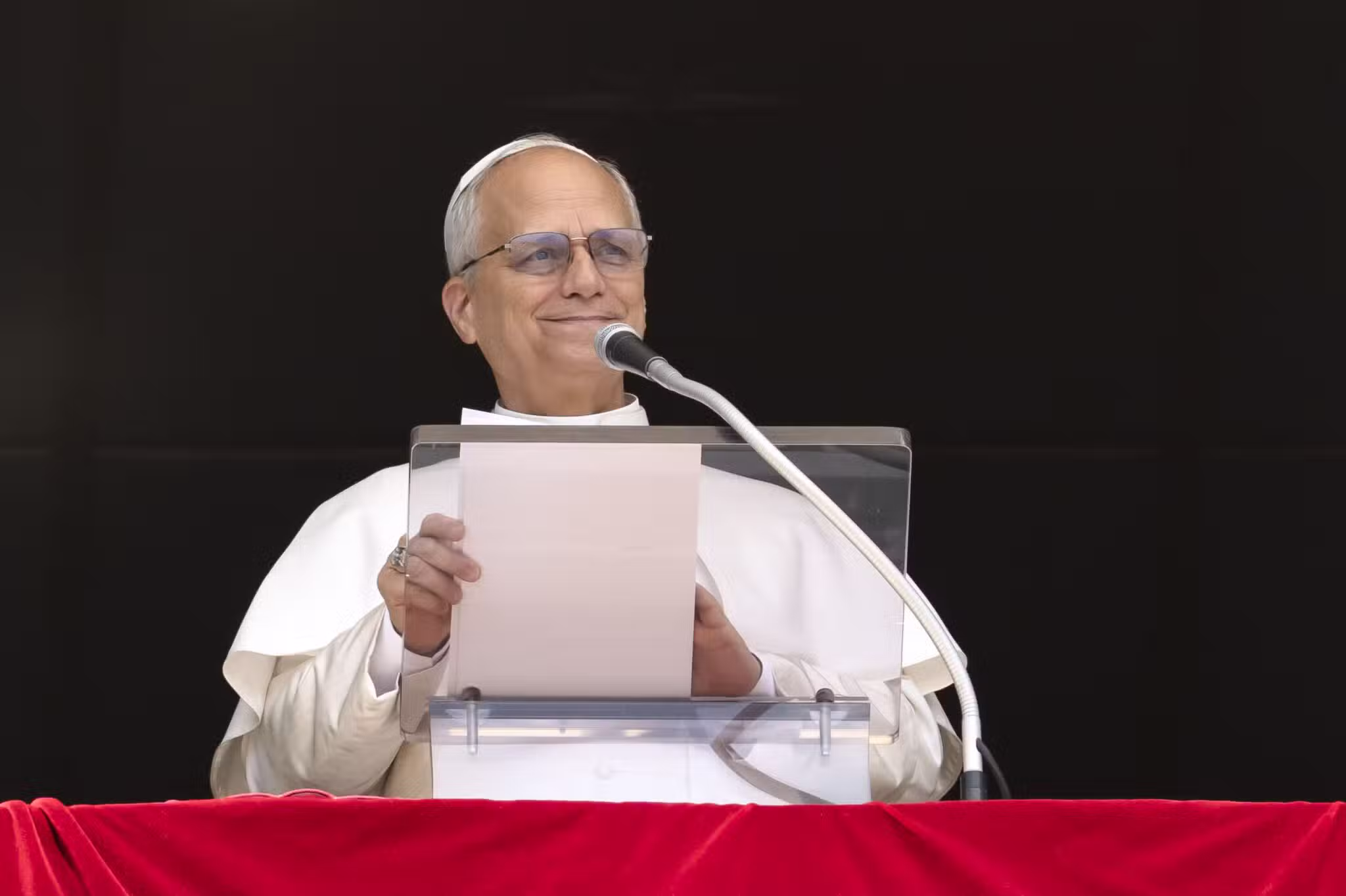 Pope Leo XIV leads the recitation of the Angelus prayer with visitors gathered in St. Peter's Square at the Vatican Aug. 24, 2025.