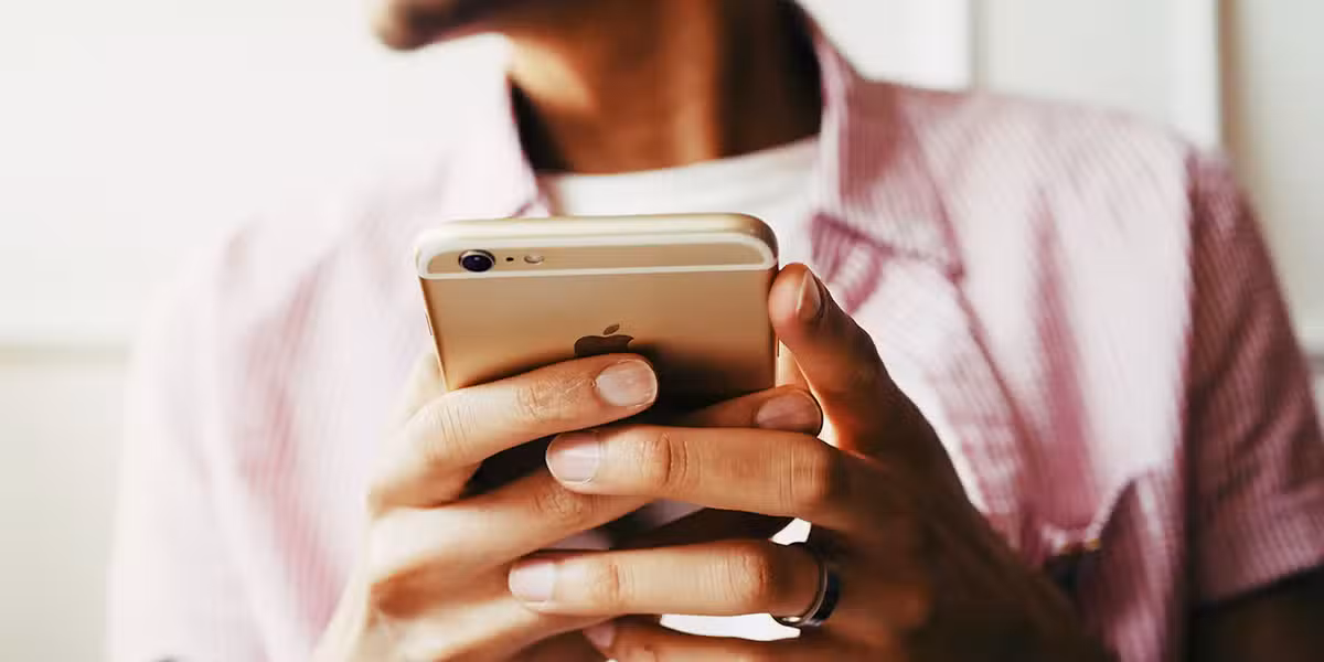 Person holding a smart phone.