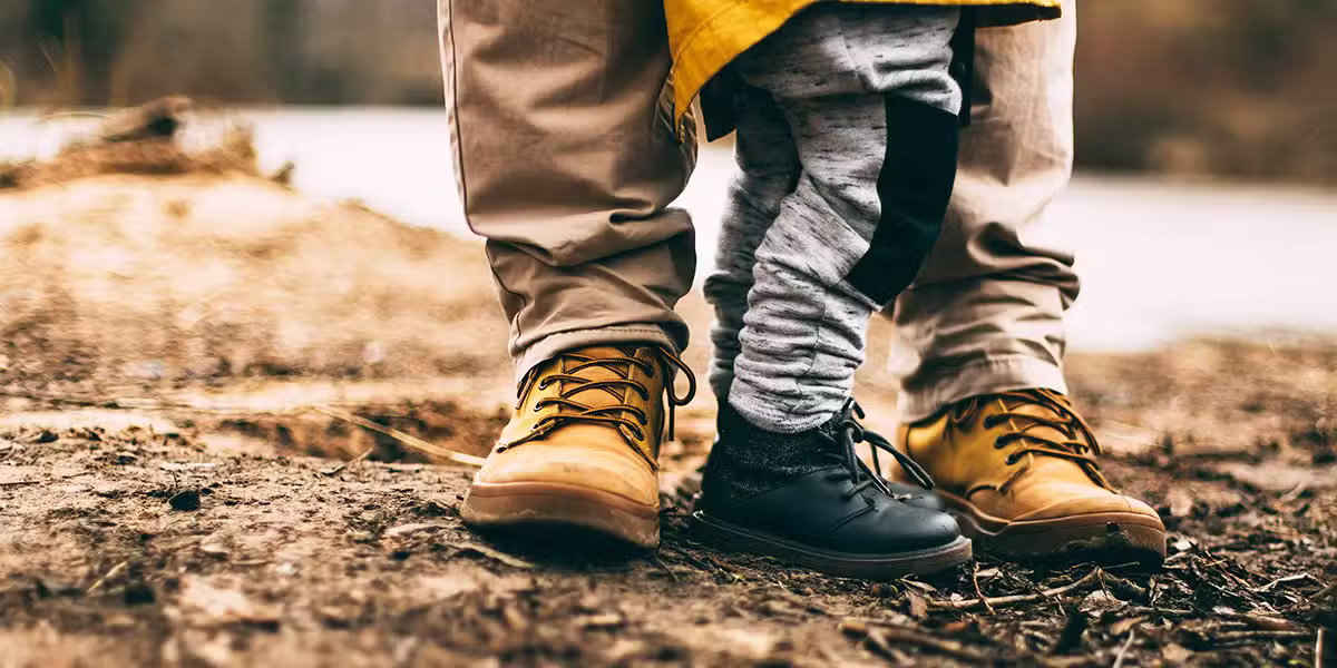 Child and father | Photo by Daiga Ellaby on Unsplash