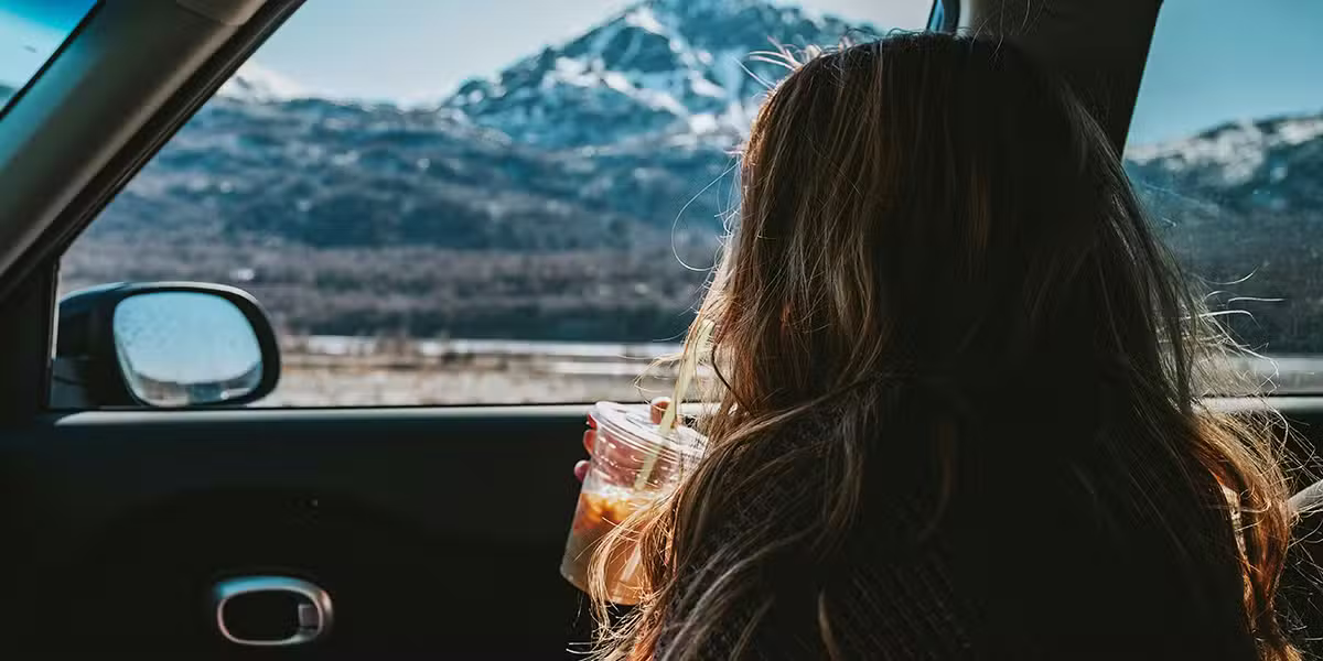 Woman in a car | Photo by Taylor Murphy on Unsplash