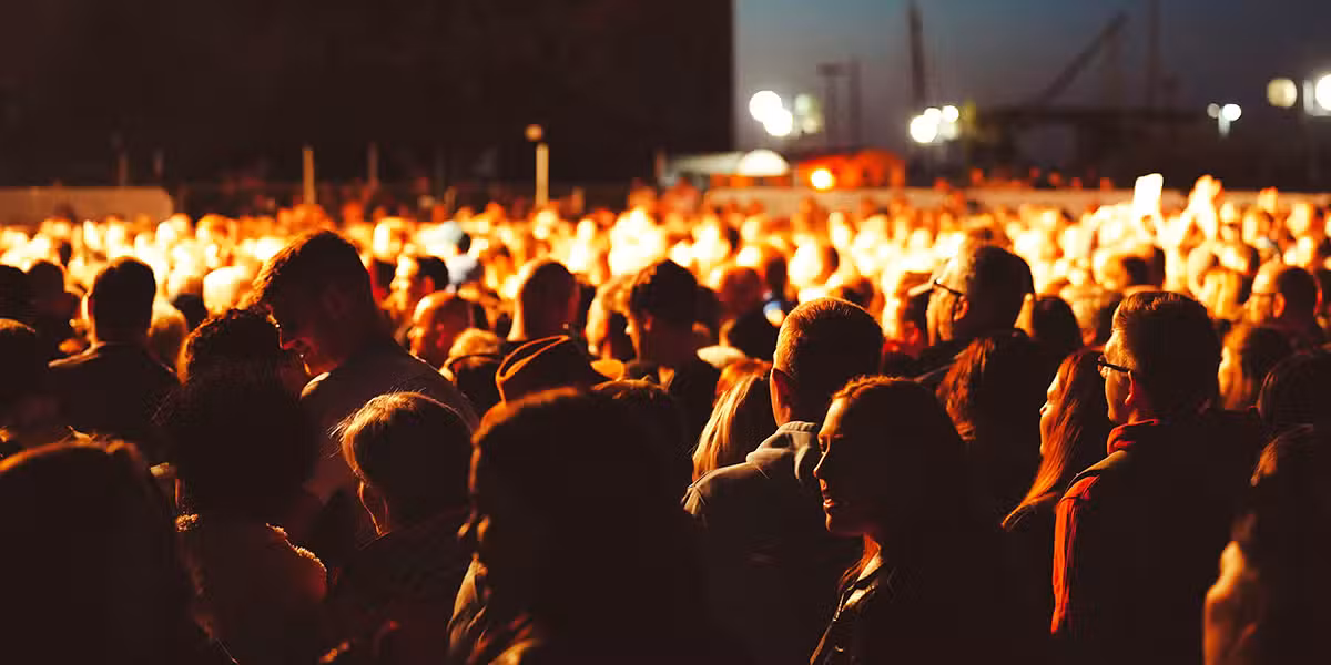 People at a concert for Jesus | Photo by A Friend on Unsplash