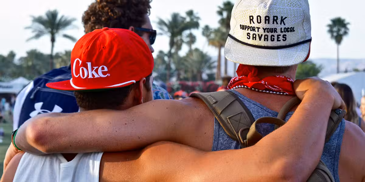 People embrace | Photo by Tommy Briskey on Unsplash