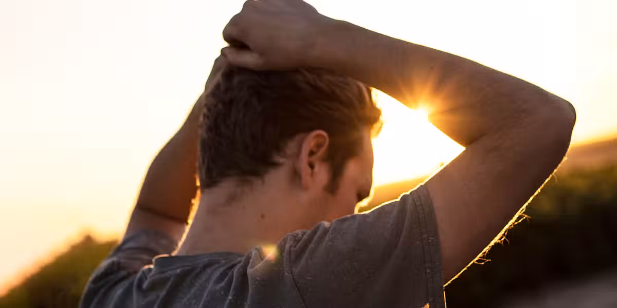 Man at sunshine | Photo by Jeremy Perkins on Unsplash