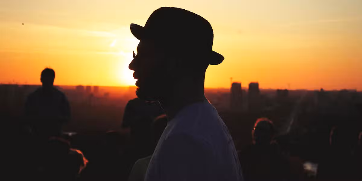 Man and sunrise | Photo by Eugene Chystiakov on Unsplash