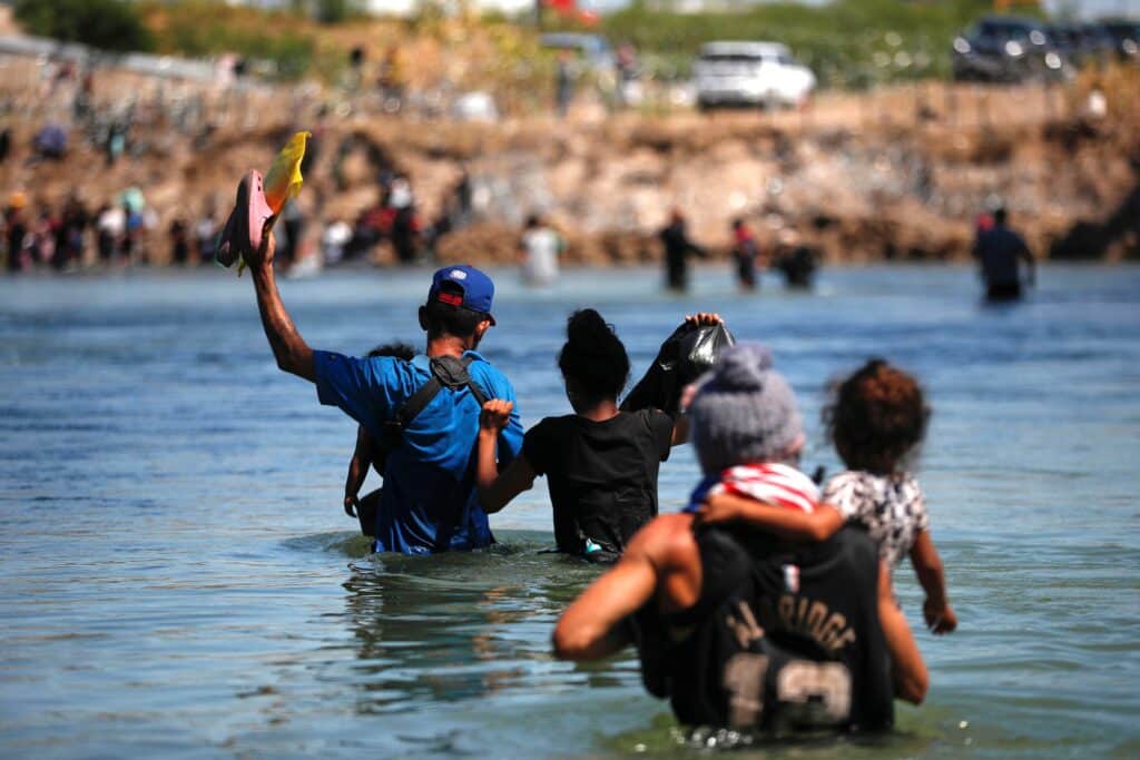 A group of migrants cross the Rio Grande in an attempt to seek asylum into the U.S., as seen from Piedras Negras, Mexico, Sept. 28, 2023. (OSV News photo/Daniel Becerril, Reuters)
