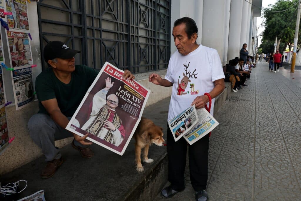 People hold newspapers in Chiclayo, Peru, May 9, 2025, reporting on the election of Pope Leo XIV, who is a dual U.S.-Peruvian citizen. Formerly Cardinal Robert F. Prevost, the prelate was elected pope May 8 at the Vatican, becoming the first American pope in history. As an Augustinian priest, then-Father Prevost spent many years as a missionary in Peru and later as Chiclayo's bishop. (OSV News photo/Sebastian Castaneda, Reuters)