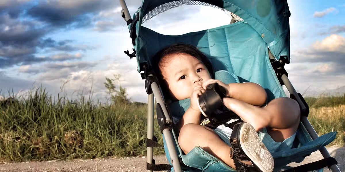 the divine child; baby in a stroller.