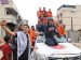 Al Jazeera reporter Nour Abu Rokba works as Palestinian emergency personnel celebrate in Khan Younis, in the southern Gaza Strip