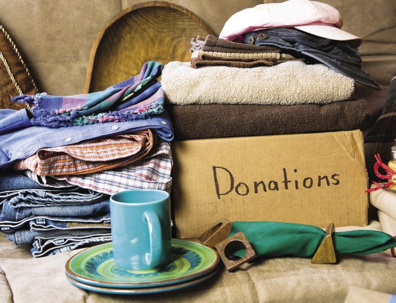 A box of items sits ready for donation.