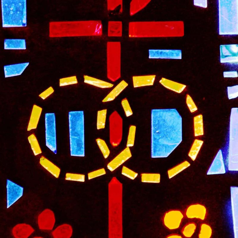 A pair of wedding bands symbolizing the sacrament of marriage is depicted in a stained-glass window at St. Isabel Church in Sanibel, Fla. (OSV News photo/CNS filer, Gregory A. Shemitz)