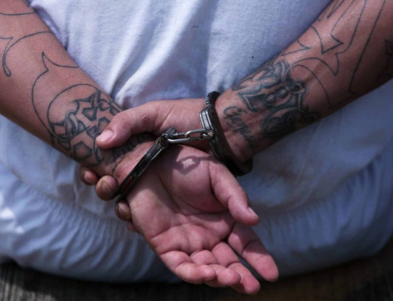 At Kolbe House, an arrested criminal is seen in this illustration photo. Virginia Gov. Ralph Northam signed legislation March 24, 2021, making Virginia the 23rd state to abolish the death penalty. (CNS photo/Victor Pena, Reuters)