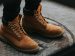 person wearing boots standing in the center of a circle