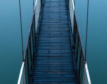 Bridge over still water