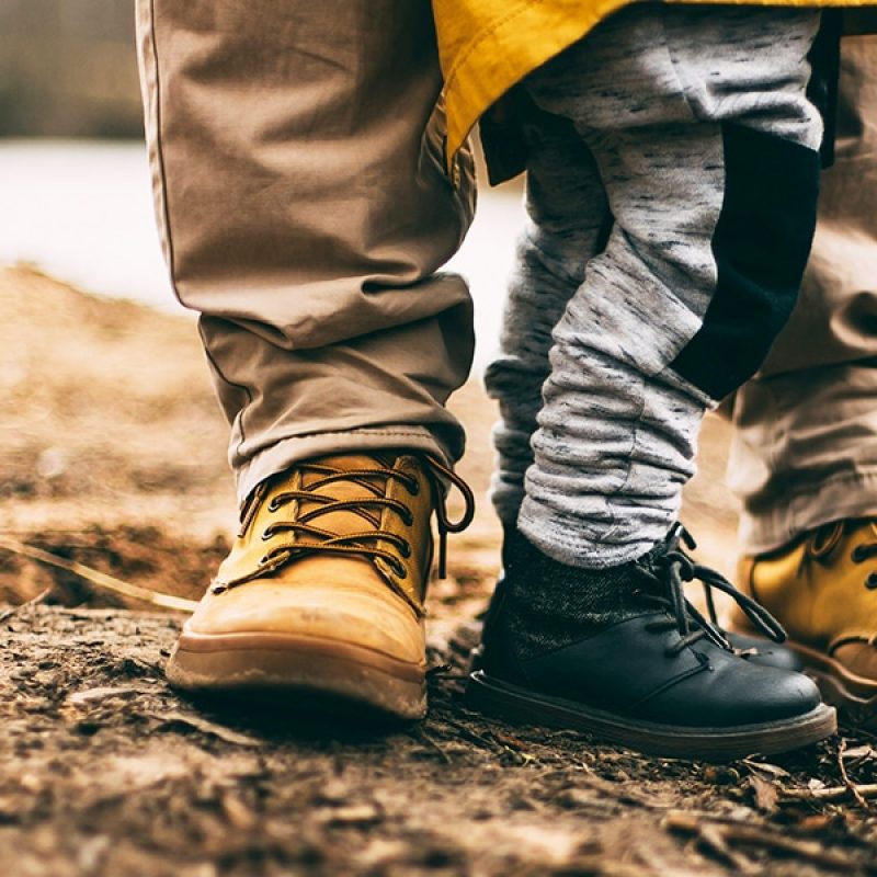 Child and father | Photo by Daiga Ellaby on Unsplash