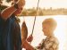 Father and son fishing together.