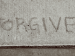 forgive-sidewalk forgive written on sidewalk