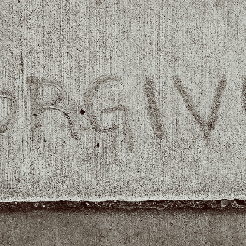 forgive-sidewalk forgive written on sidewalk