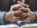 hands_folded_prayer man praying with folded hands.