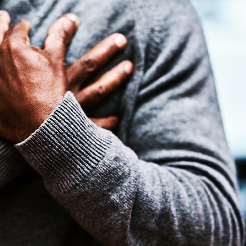 hands crossed over heart in sign of humility
