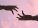 hand reaching out to help other hand