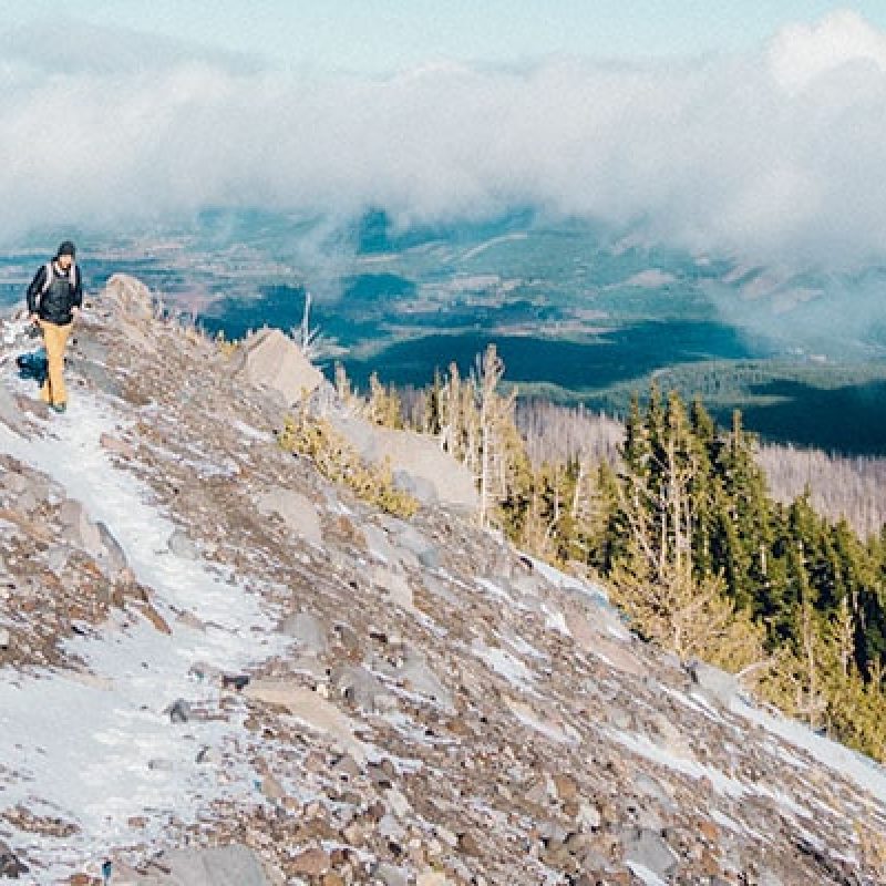hiker-snow-covered-trail