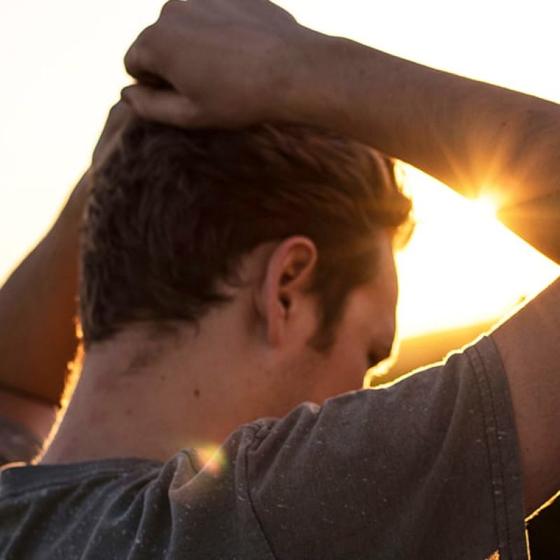 Man at sunshine | Photo by Jeremy Perkins on Unsplash
