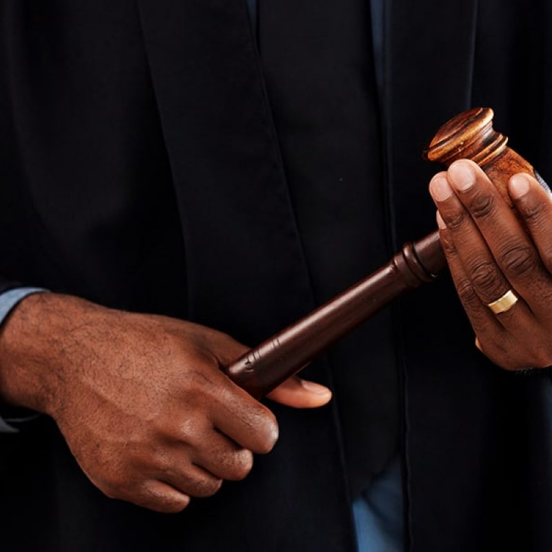 judge holding a gavel in his hands